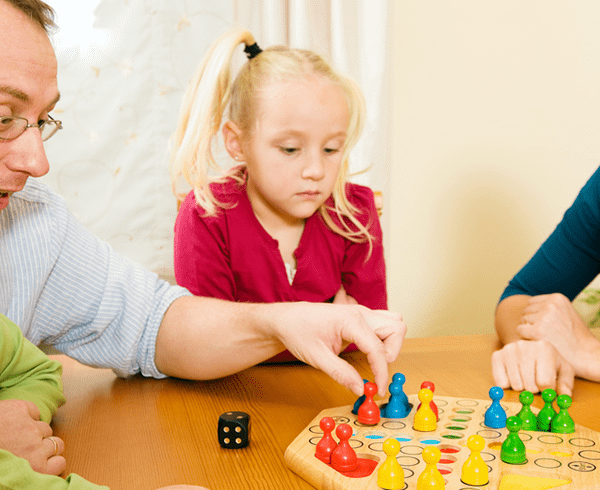 Family playing board game