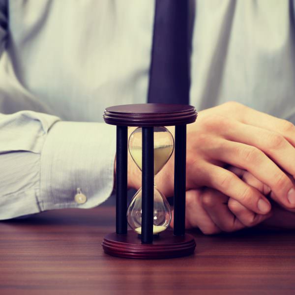 Hour glass on table